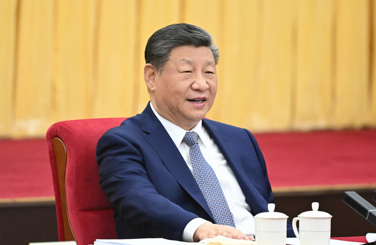 习近平在看望参加政协会议的农工党九三学...